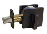 Black door handle with brass cylindrical mechanism on a white background