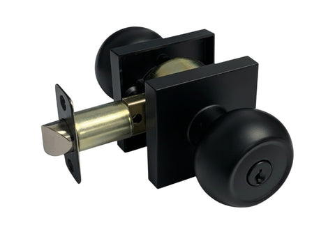 Black door handle with keyhole on a white background